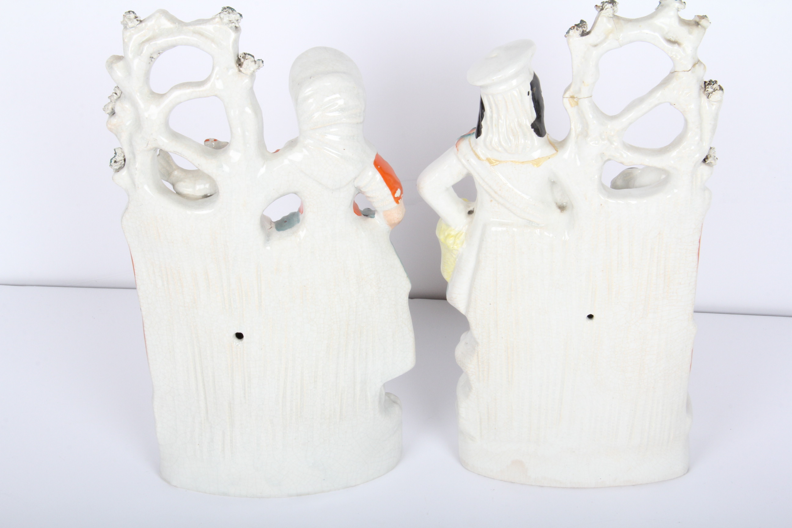 Pair of Staffordshire Scottish Figurines