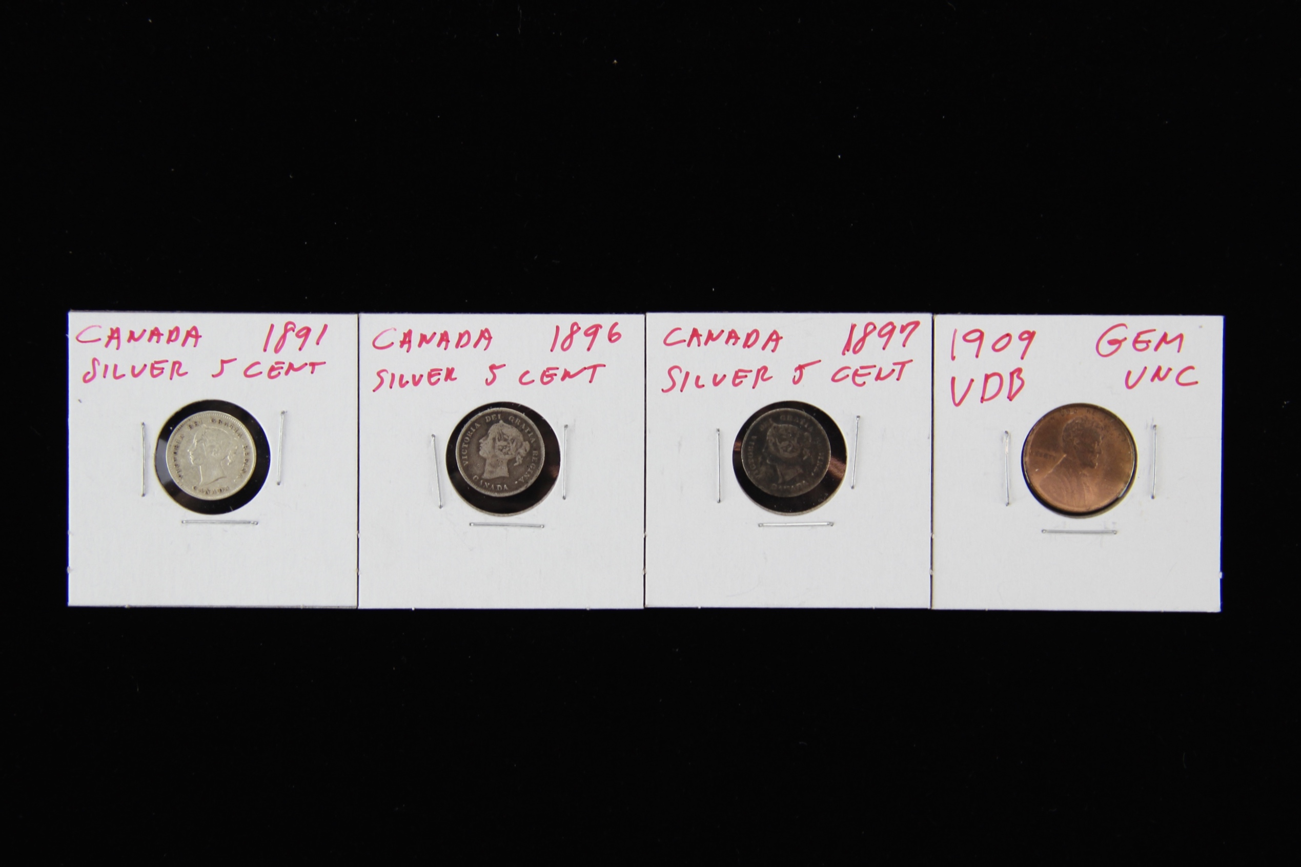 1909 VDB Wheat Penny and Three Canadian Silver Five Cent Coins