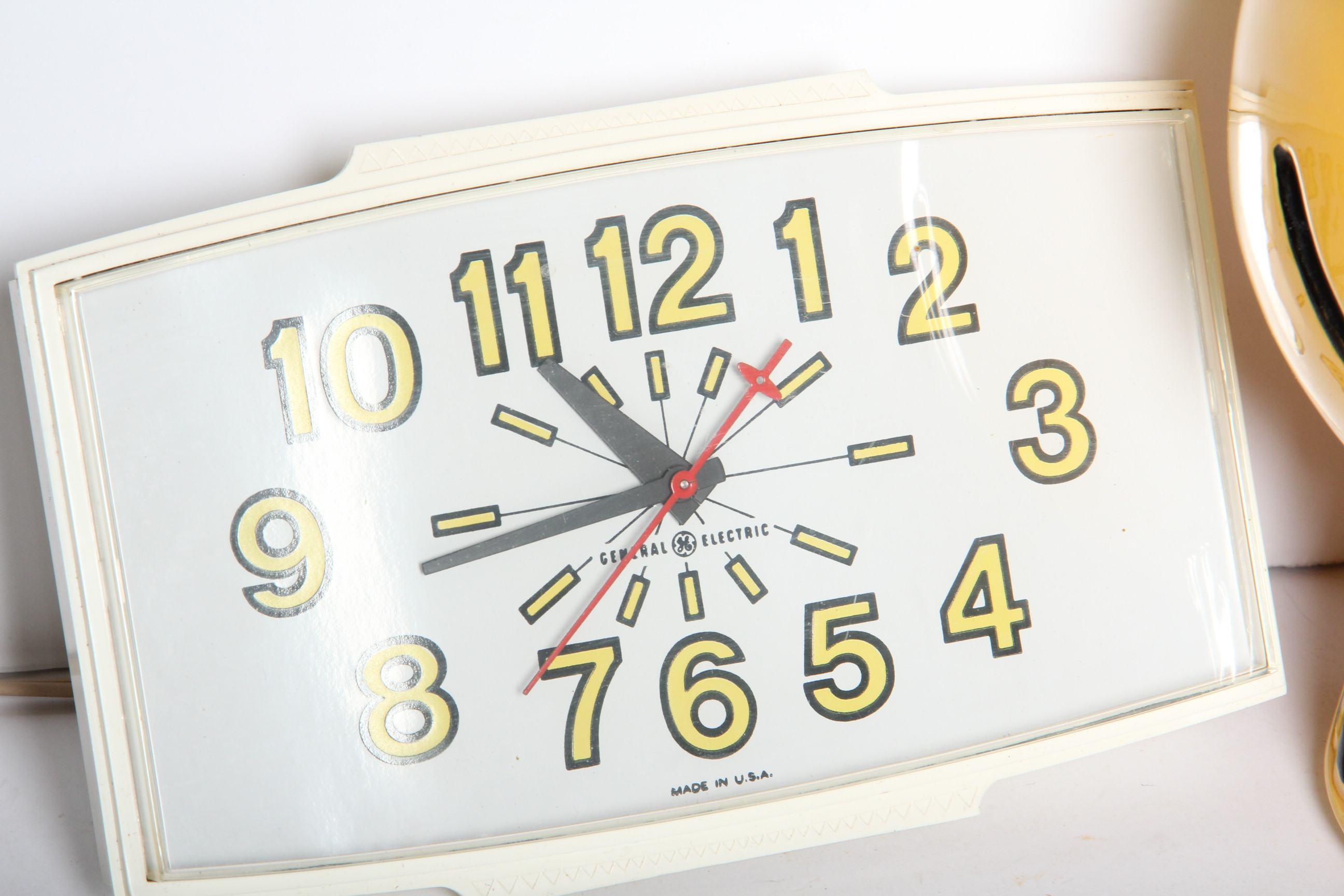 Yellow Smiley Face Cookie Jar and GE Clock