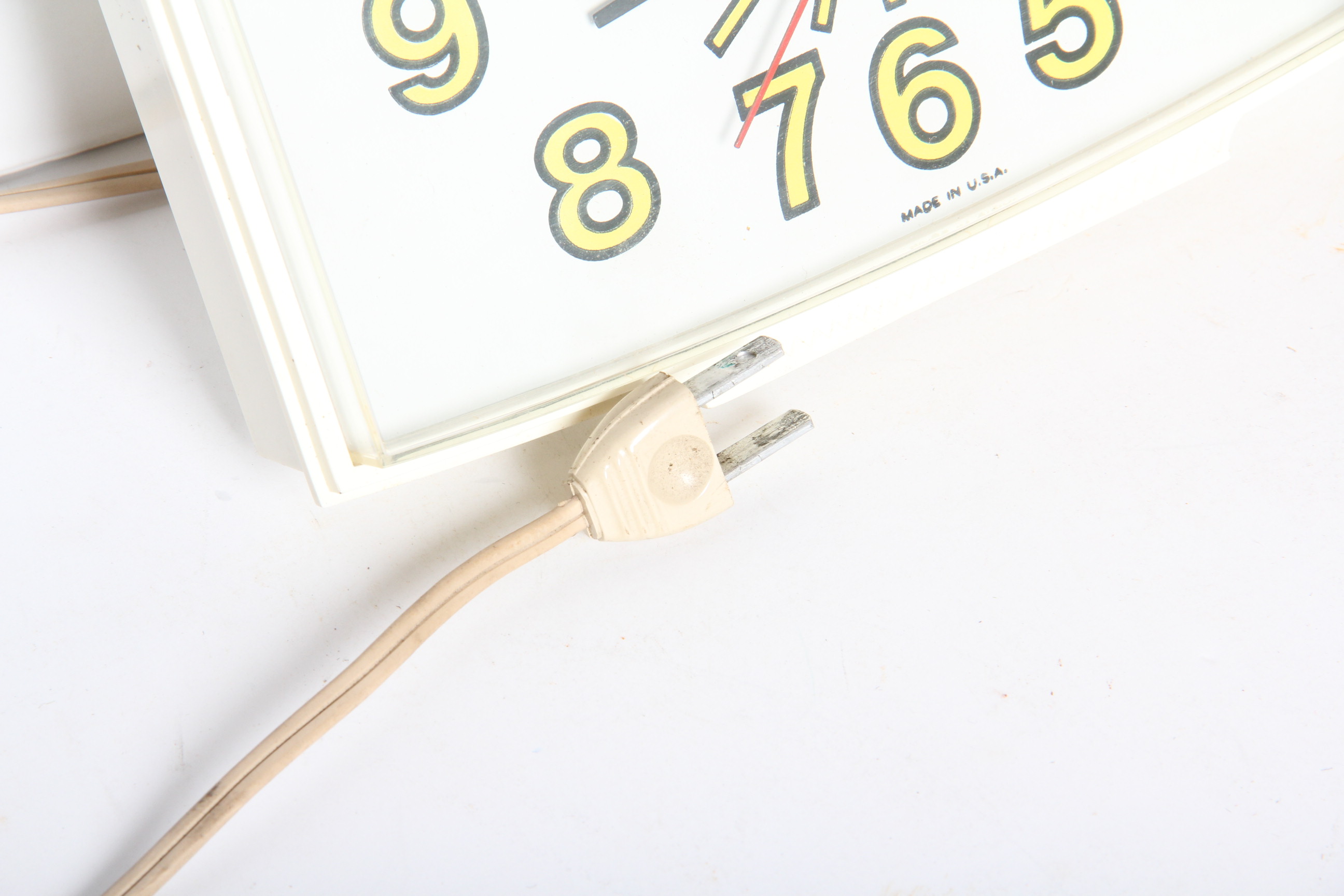 Yellow Smiley Face Cookie Jar and GE Clock