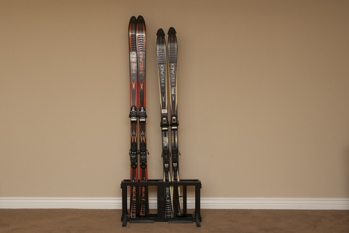 Two Pairs of Head Skis with Ski Holder