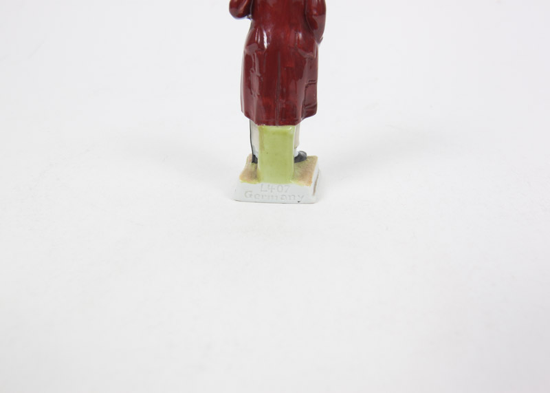 Four Porcelain Figurines Including Royal Doulton