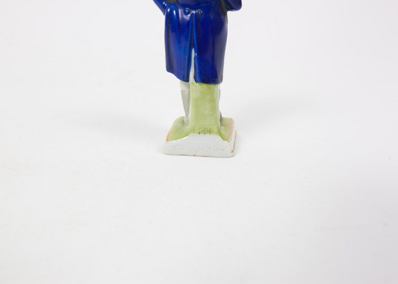 Four Porcelain Figurines Including Royal Doulton