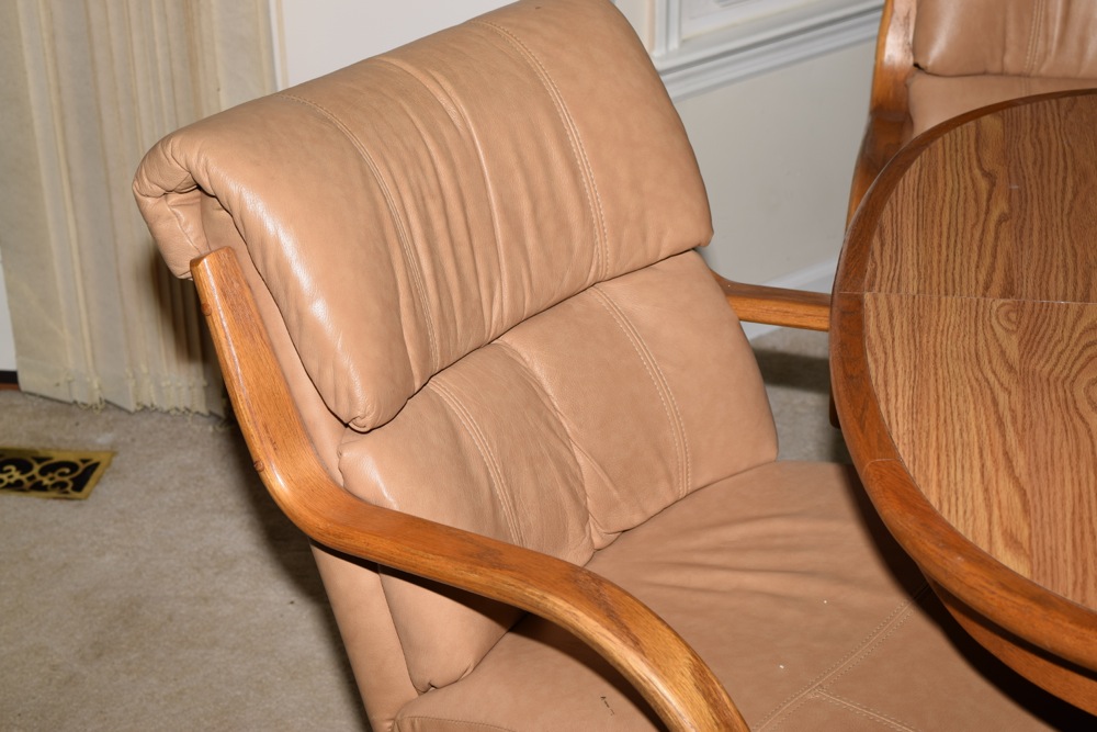 Oak Kitchen Table and Four Leather and Oak Swivel Chairs on Casters