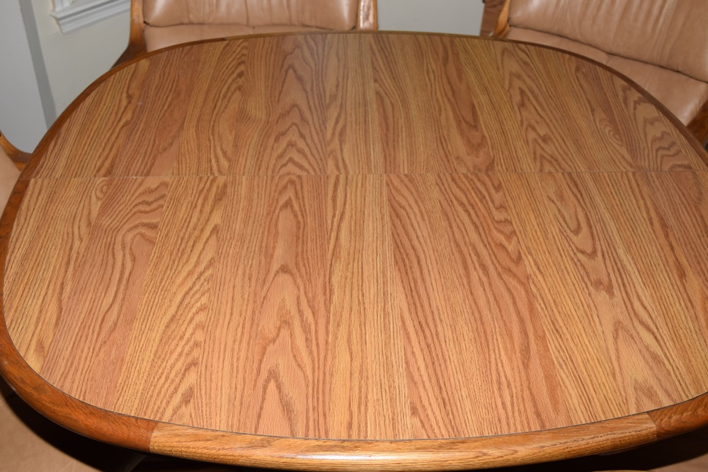 Oak Kitchen Table and Four Leather and Oak Swivel Chairs on Casters