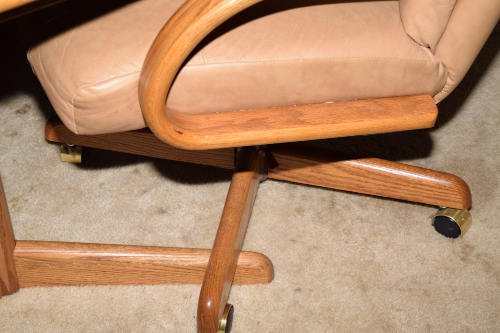 Oak Kitchen Table and Four Leather and Oak Swivel Chairs on Casters