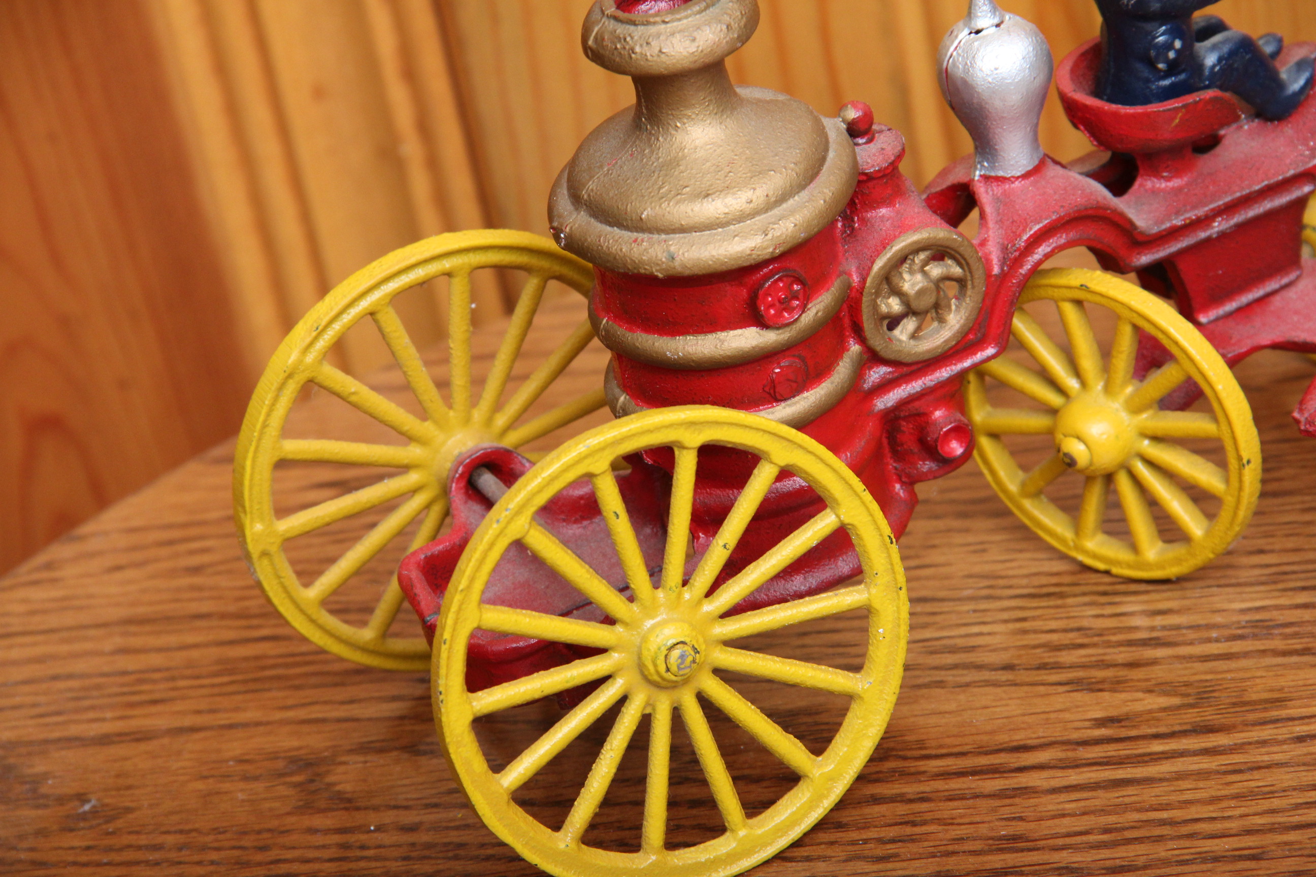 Cast Iron Fireman Figurine