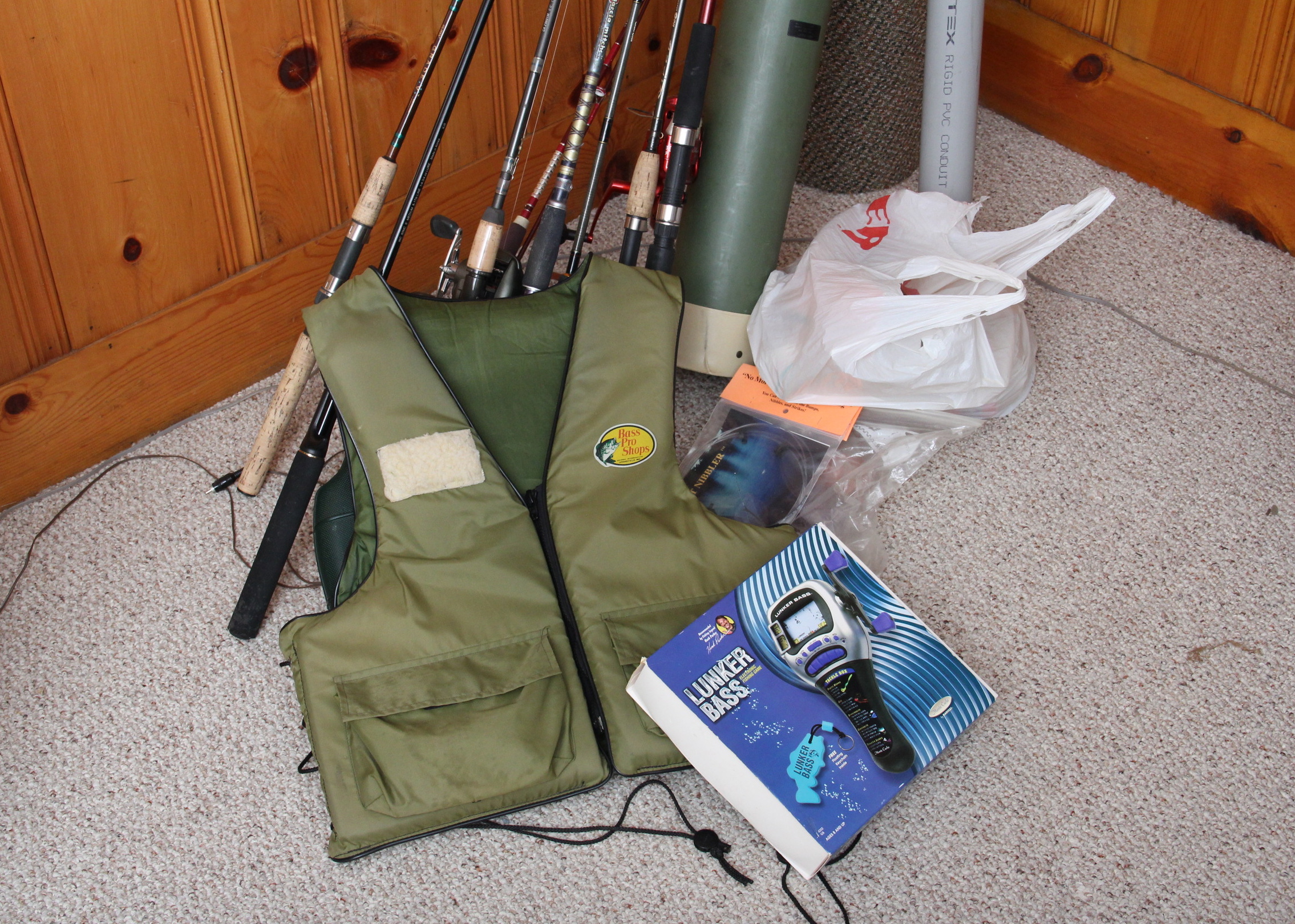 Assortment of Fishing Poles and Accessories
