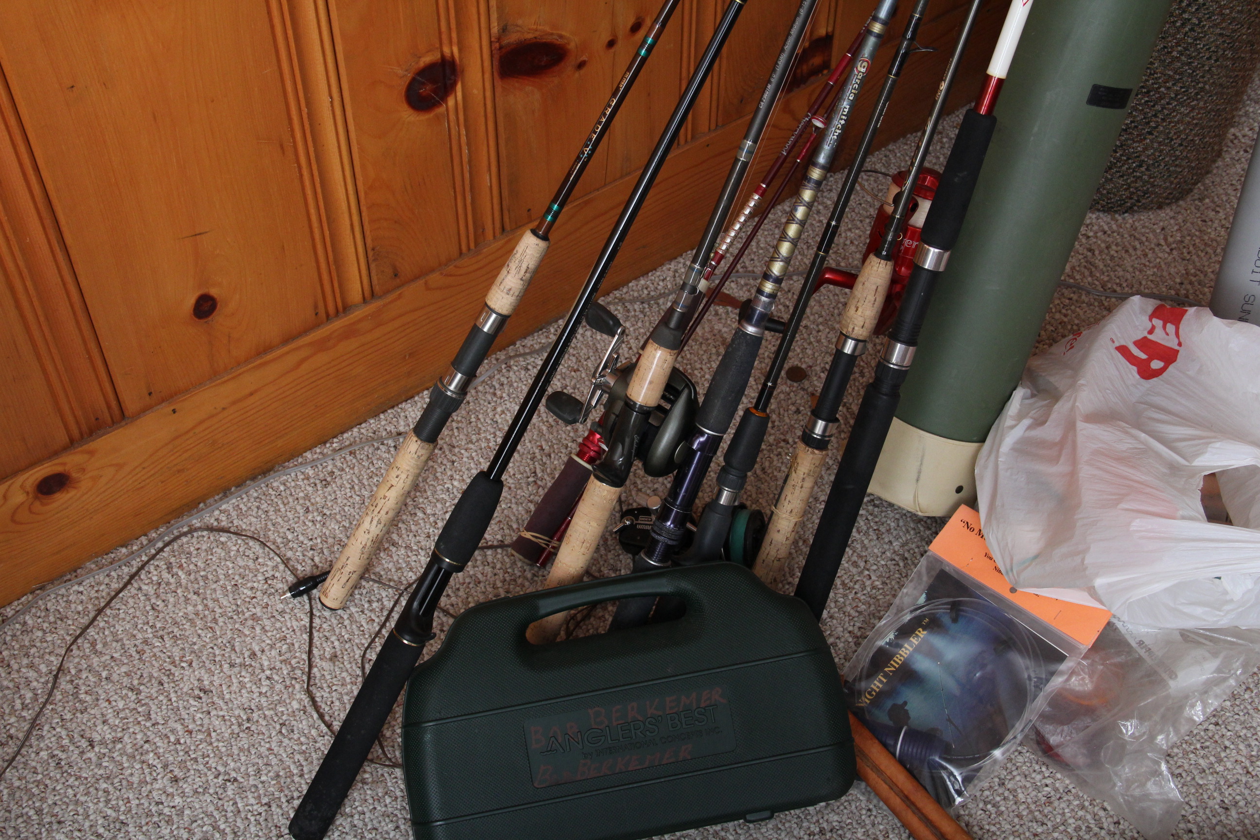 Assortment of Fishing Poles and Accessories