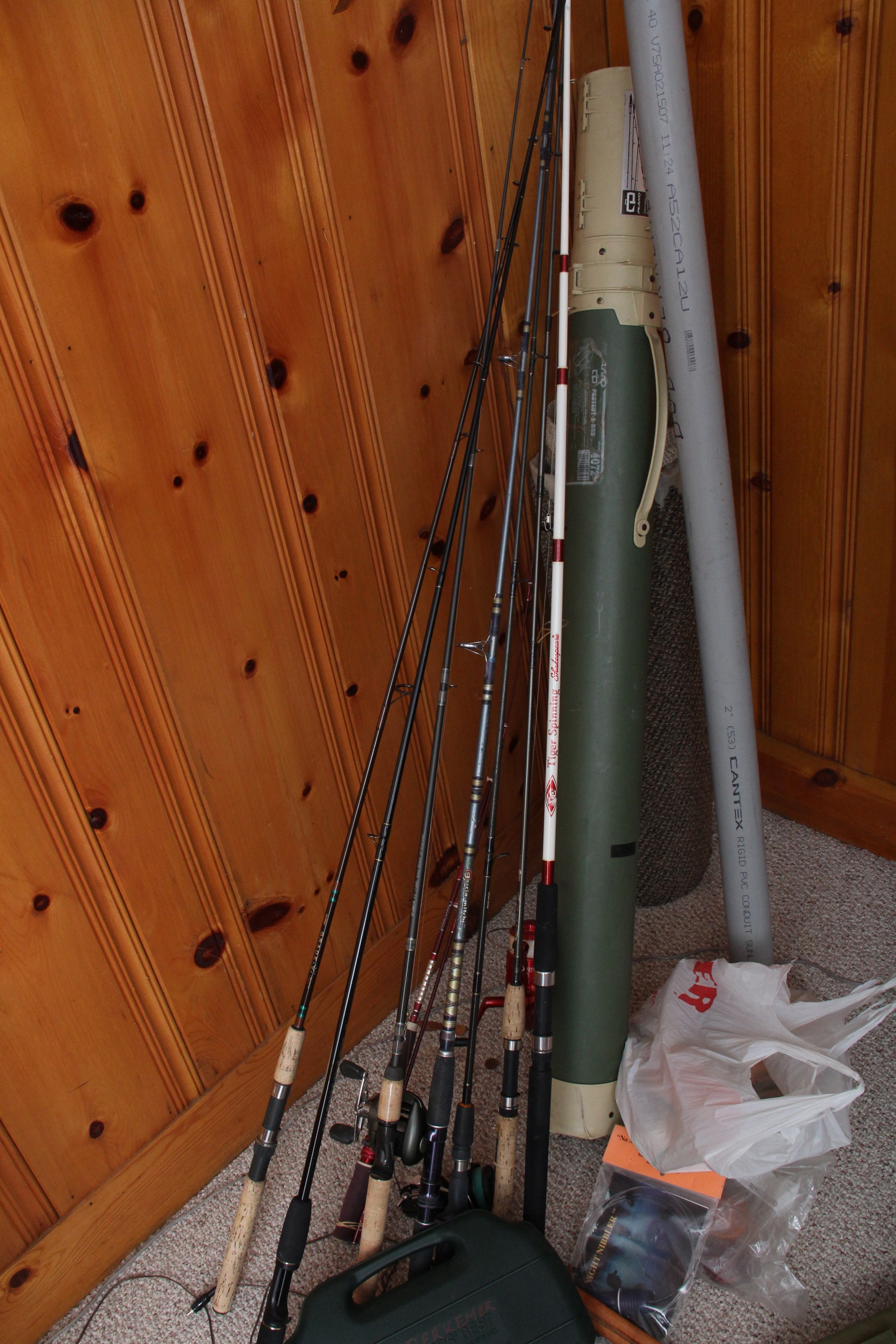 Assortment of Fishing Poles and Accessories