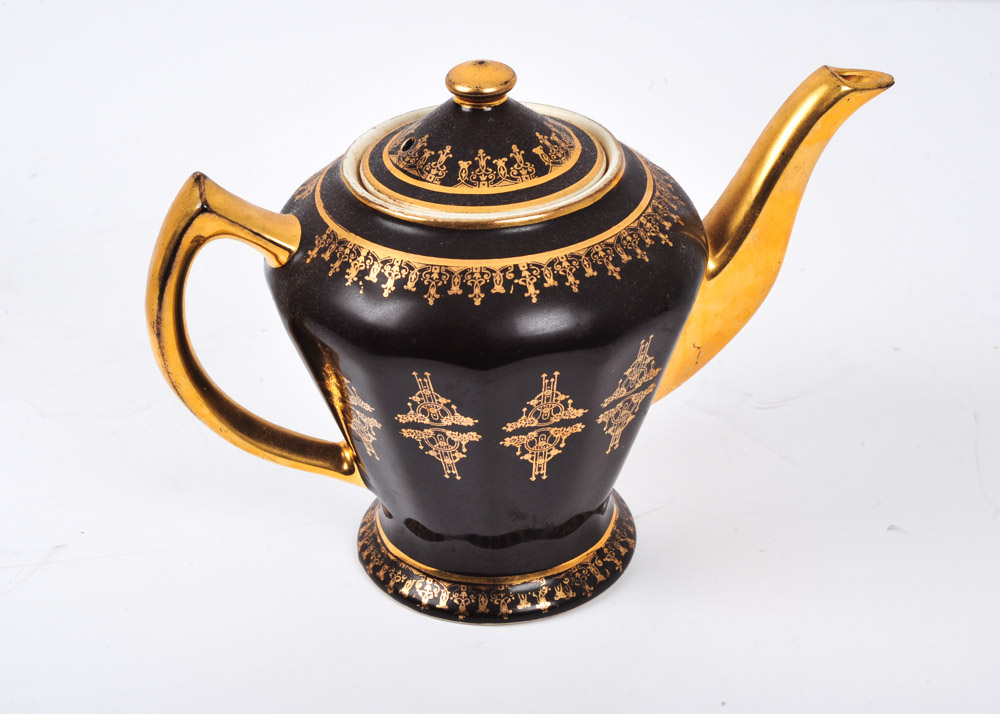 Grouping of Teapots and Pitchers