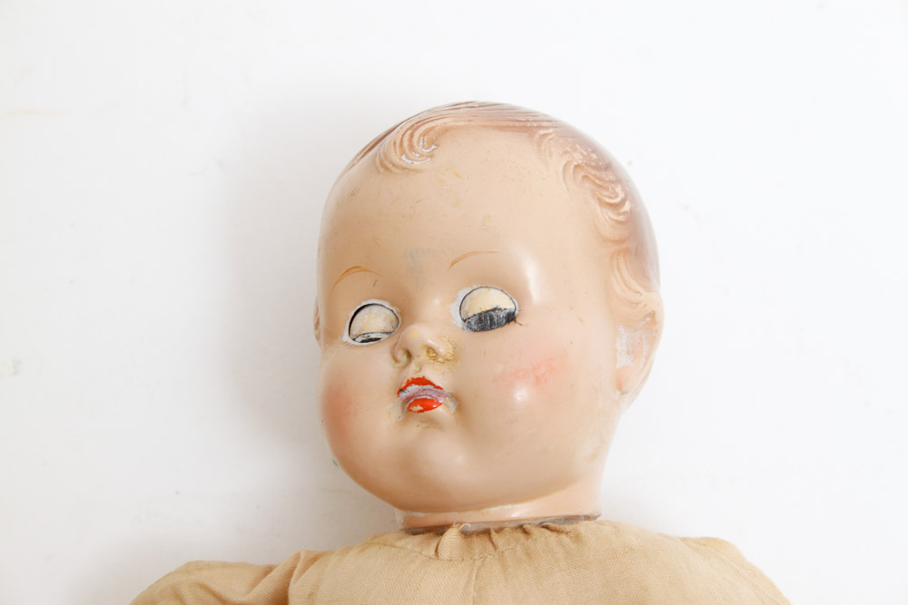 Collection of Dolls Including Shirley Temple Doll and Prints