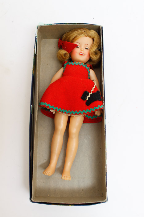 Collection of Dolls Including Shirley Temple Doll and Prints
