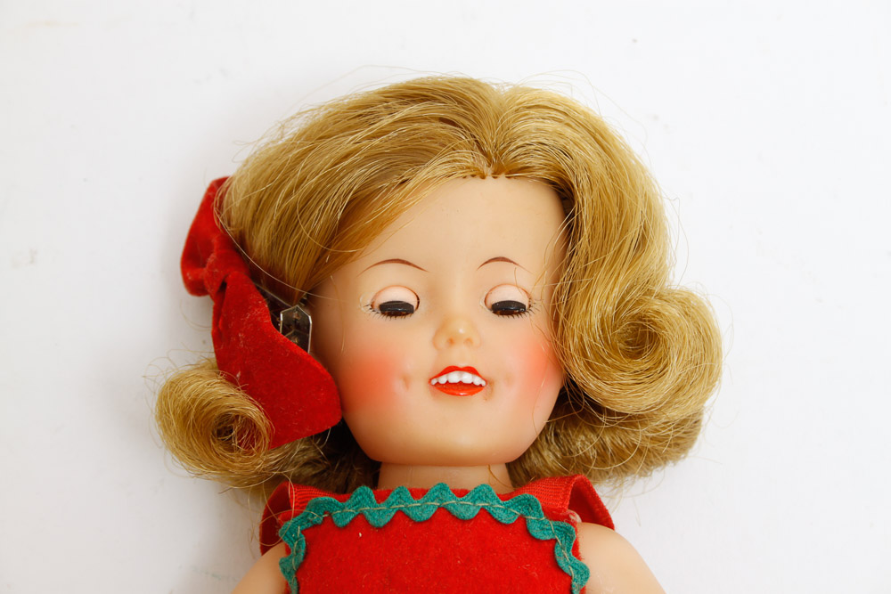 Collection of Dolls Including Shirley Temple Doll and Prints