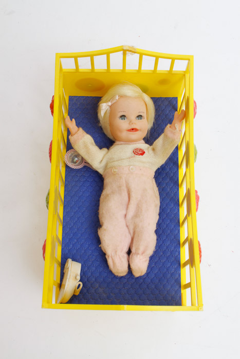 Collection of Dolls Including Shirley Temple Doll and Prints