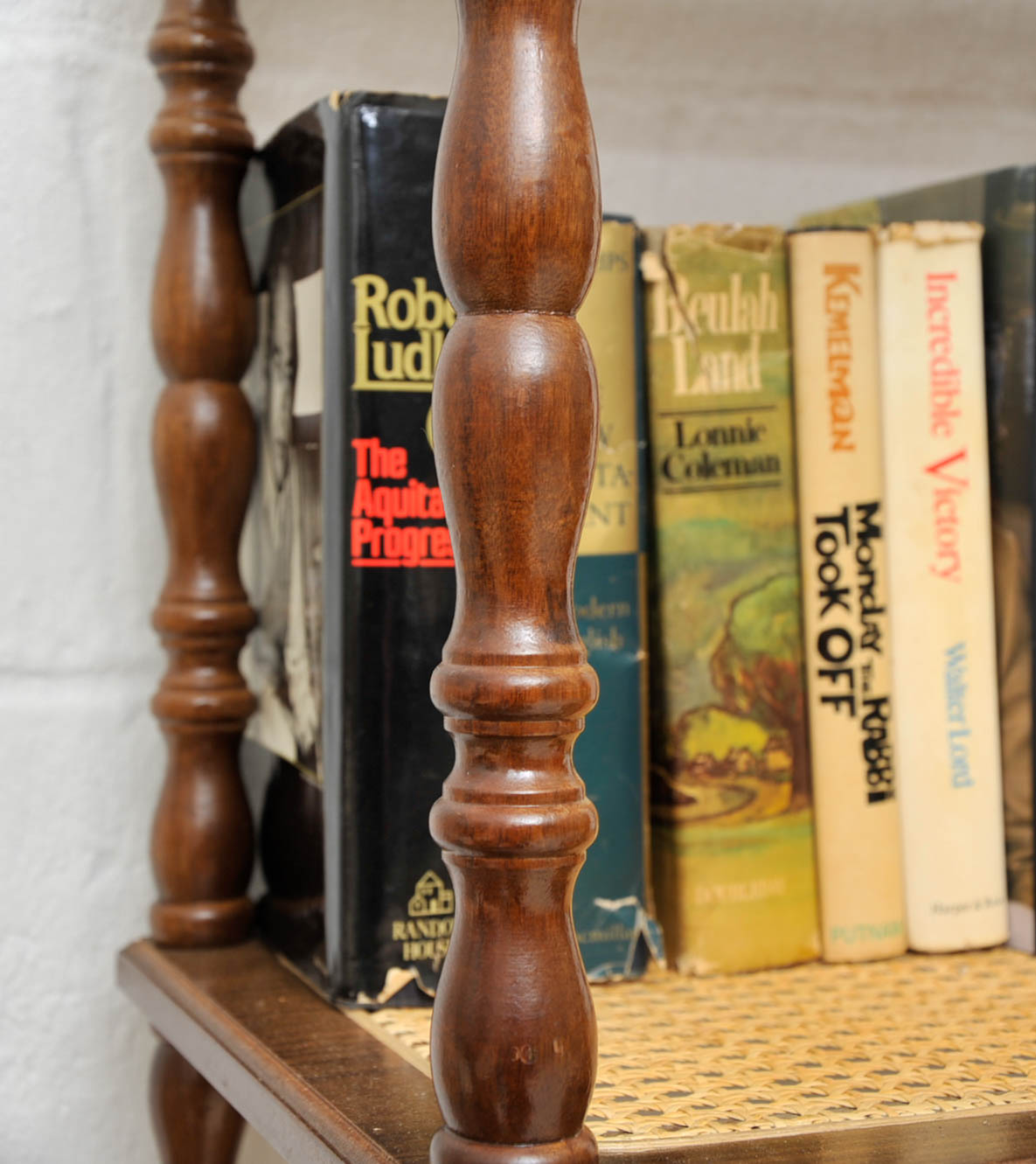 Wooden Shelf and Assorted Books