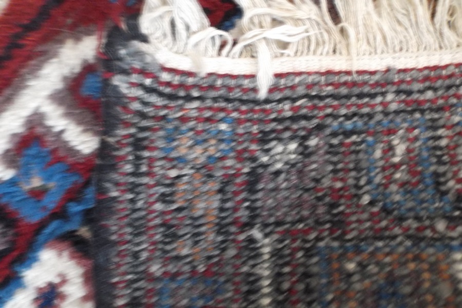 Small Tribal Machine Made Wool Mat