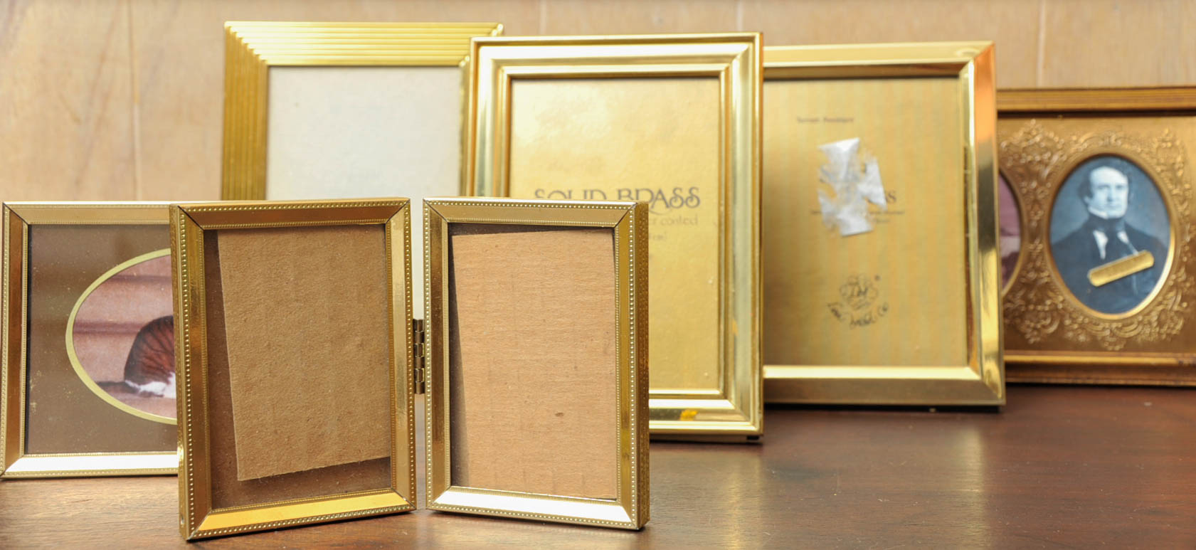 Gold Toned Picture Frames and Photo Albums