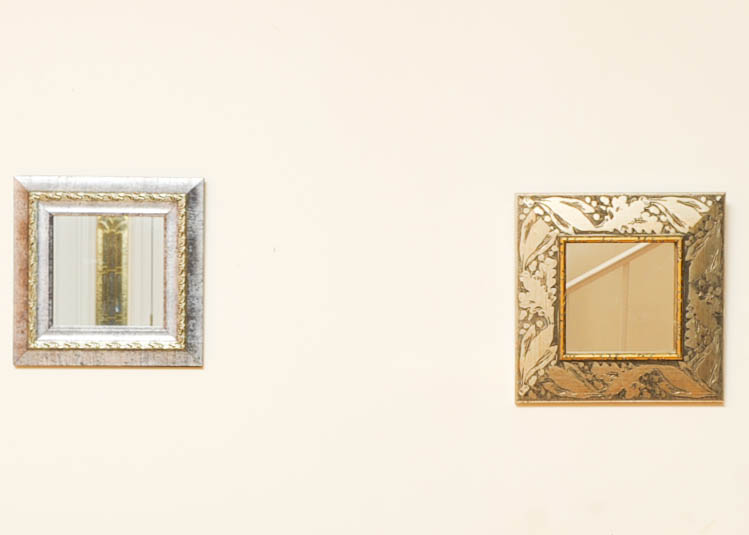 Two Framed Mirrors