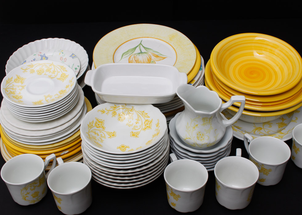 Assorted Yellow and White Ceramic Dishes