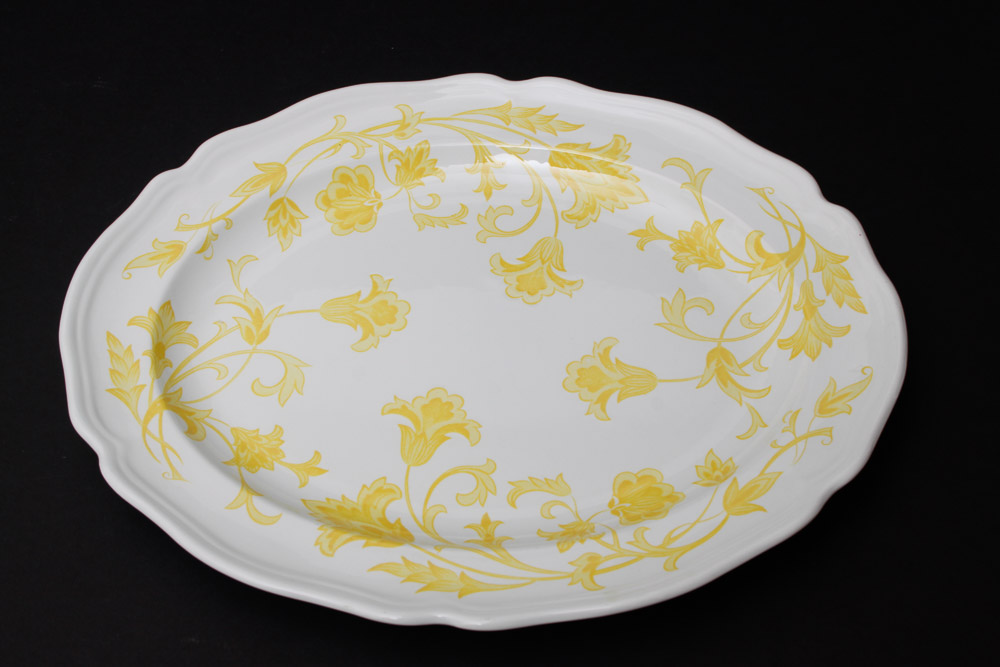 Assorted Yellow and White Ceramic Dishes
