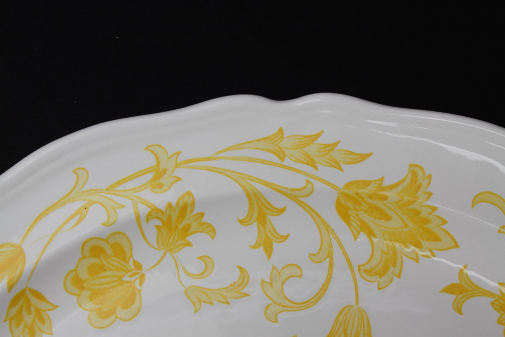 Assorted Yellow and White Ceramic Dishes