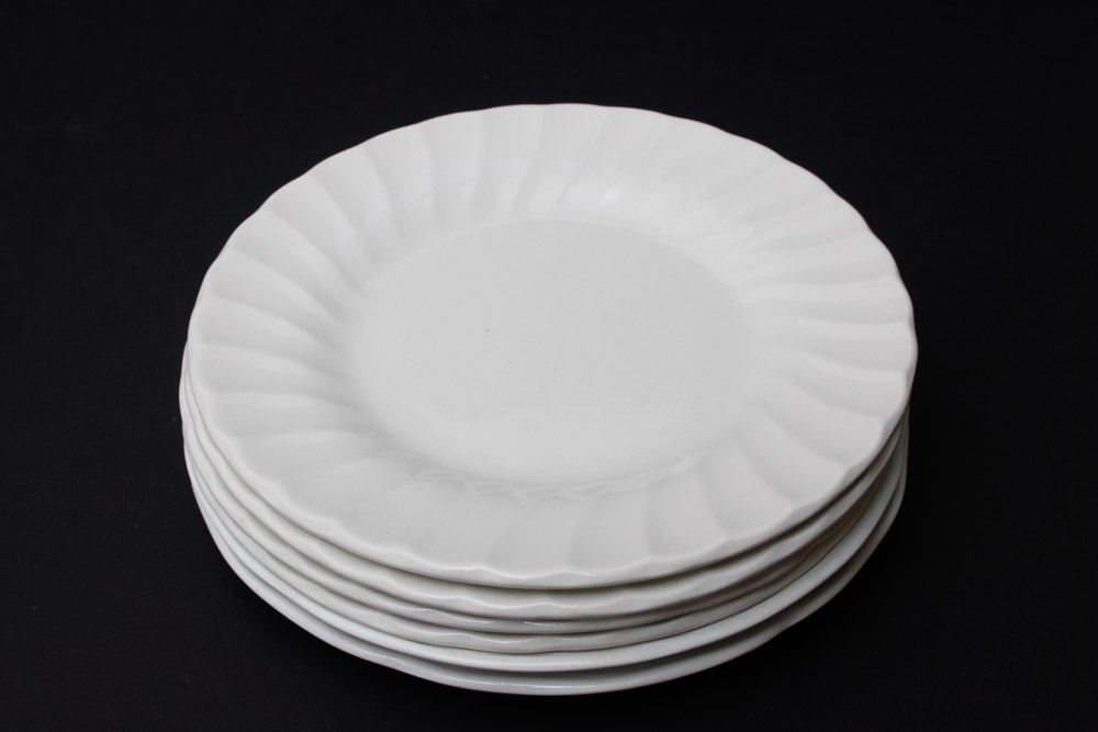 Assorted Yellow and White Ceramic Dishes