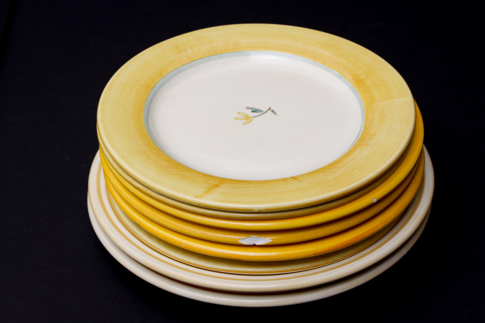 Assorted Yellow and White Ceramic Dishes