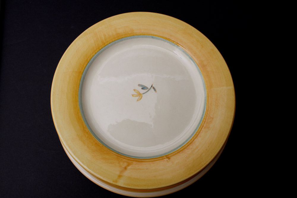 Assorted Yellow and White Ceramic Dishes