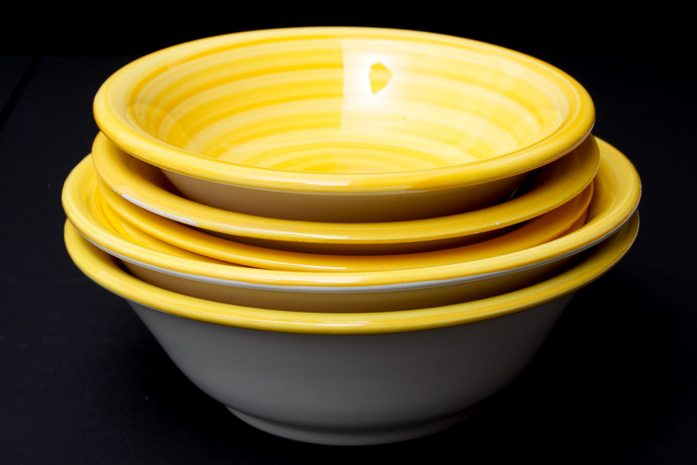 Assorted Yellow and White Ceramic Dishes