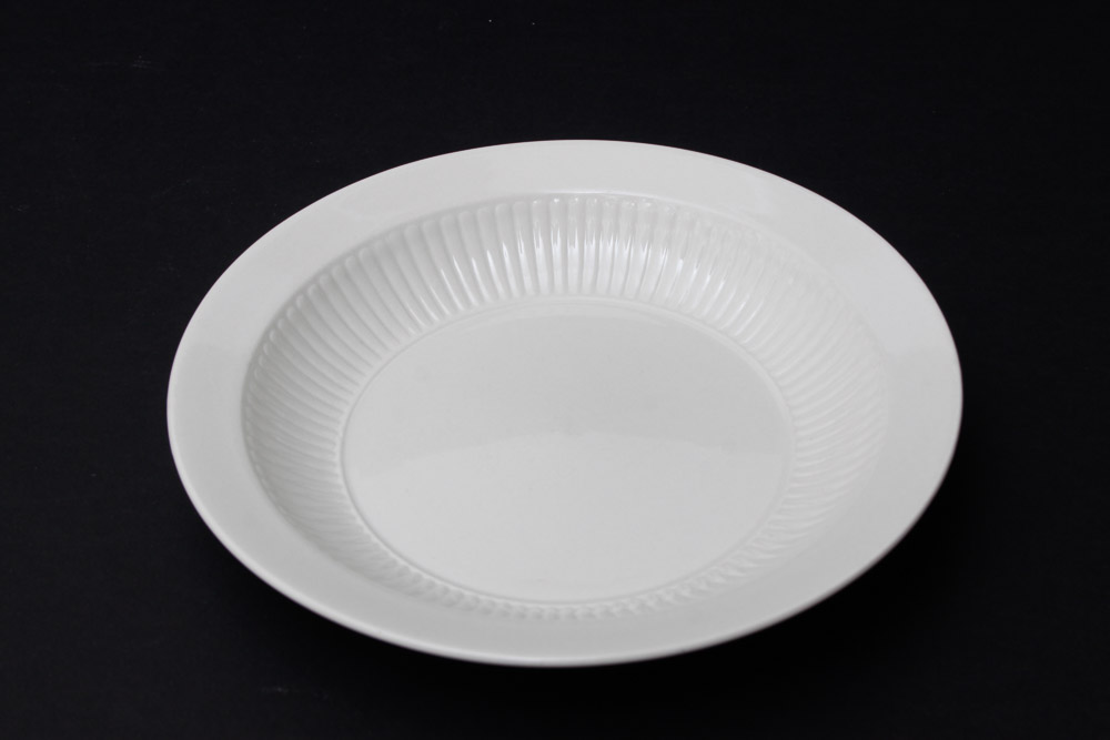 Assorted Yellow and White Ceramic Dishes