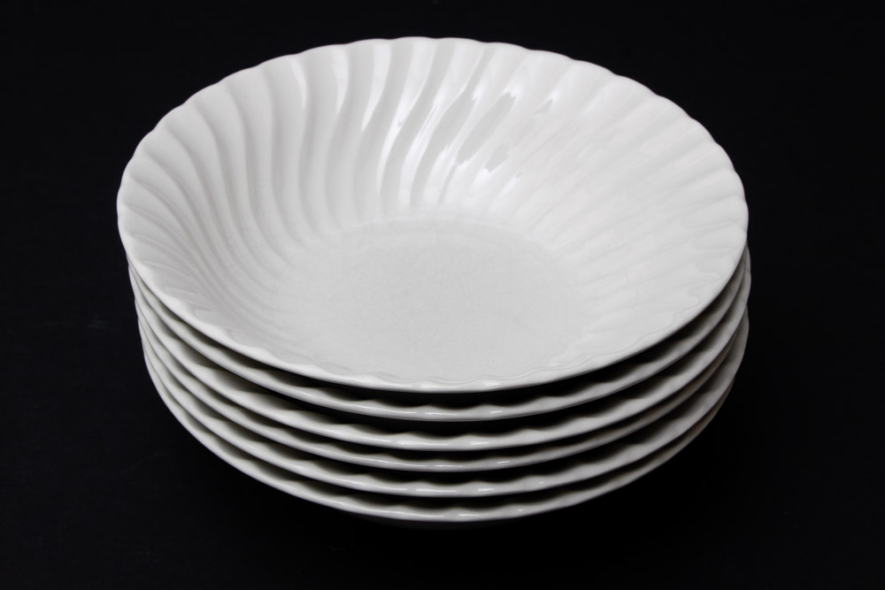 Assorted Yellow and White Ceramic Dishes