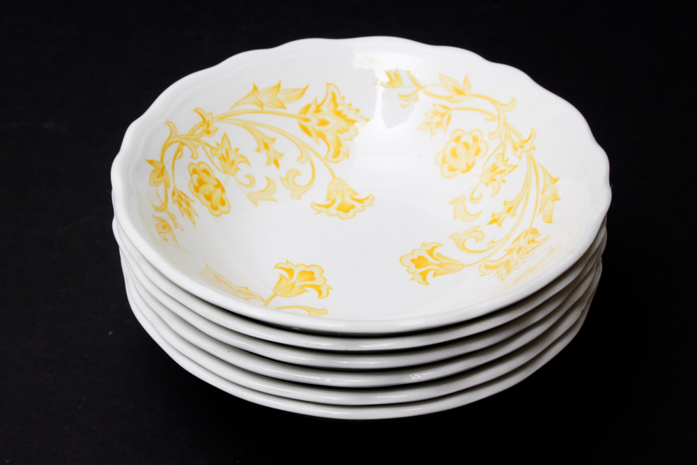 Assorted Yellow and White Ceramic Dishes