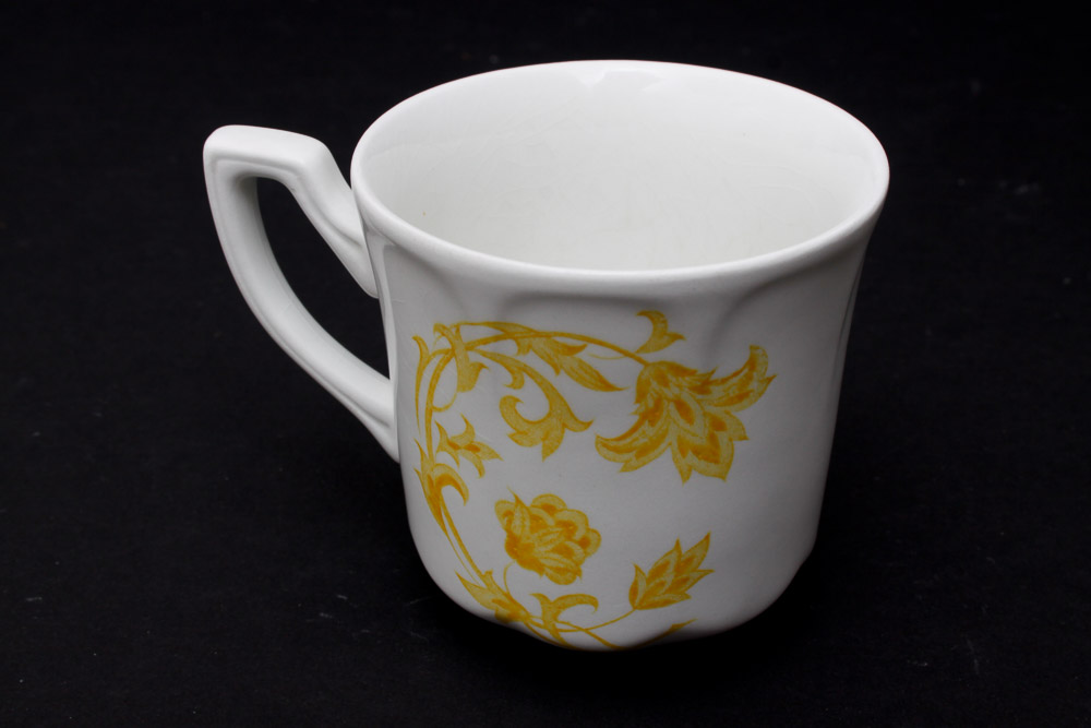 Assorted Yellow and White Ceramic Dishes