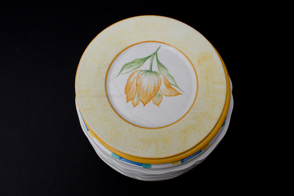 Assorted Yellow and White Ceramic Dishes