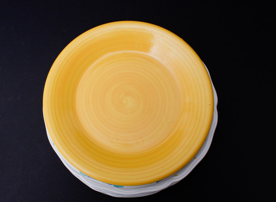 Assorted Yellow and White Ceramic Dishes