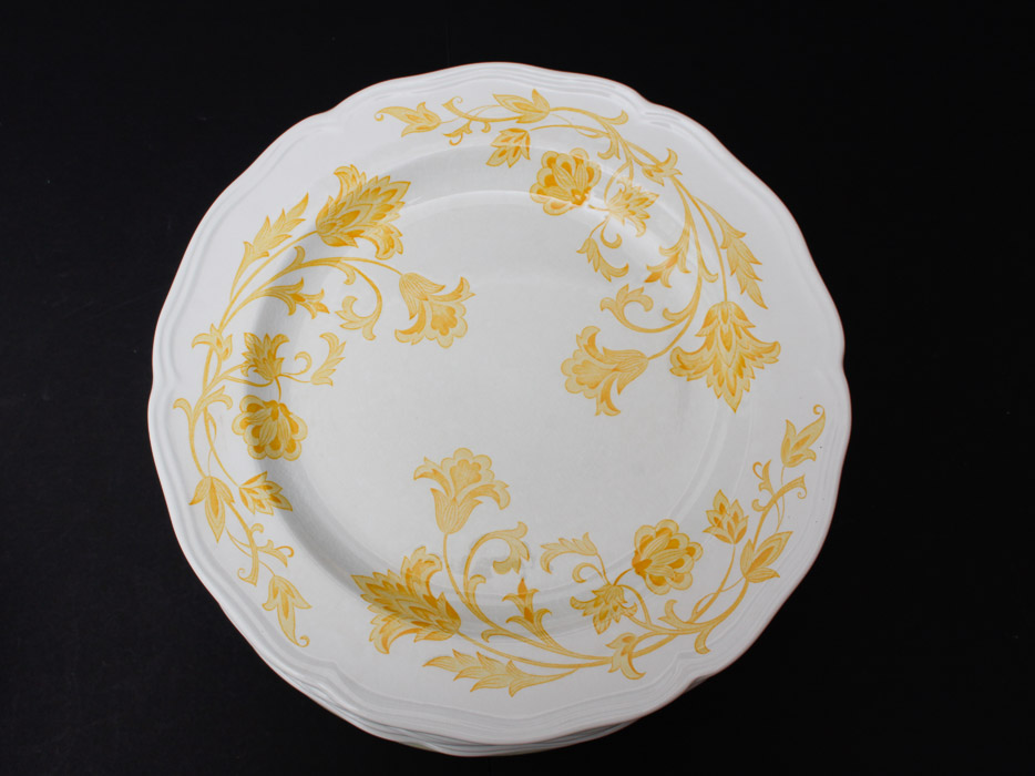 Assorted Yellow and White Ceramic Dishes
