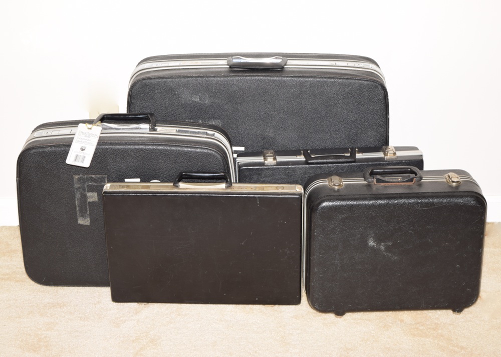 Five Vintage Black Suitcases with Handles
