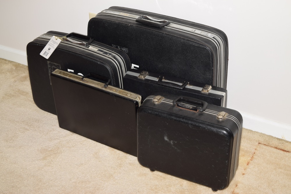 Five Vintage Black Suitcases with Handles