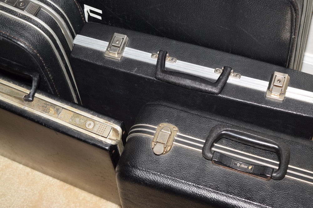Five Vintage Black Suitcases with Handles