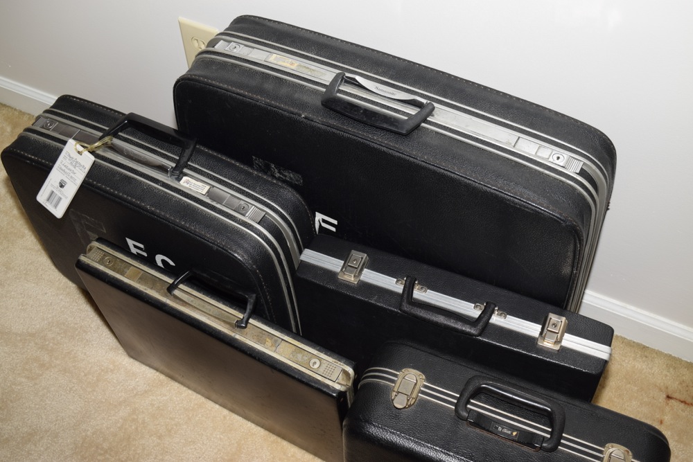 Five Vintage Black Suitcases with Handles
