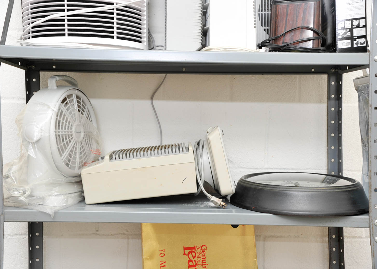 Duo of Fans and Wall Clock