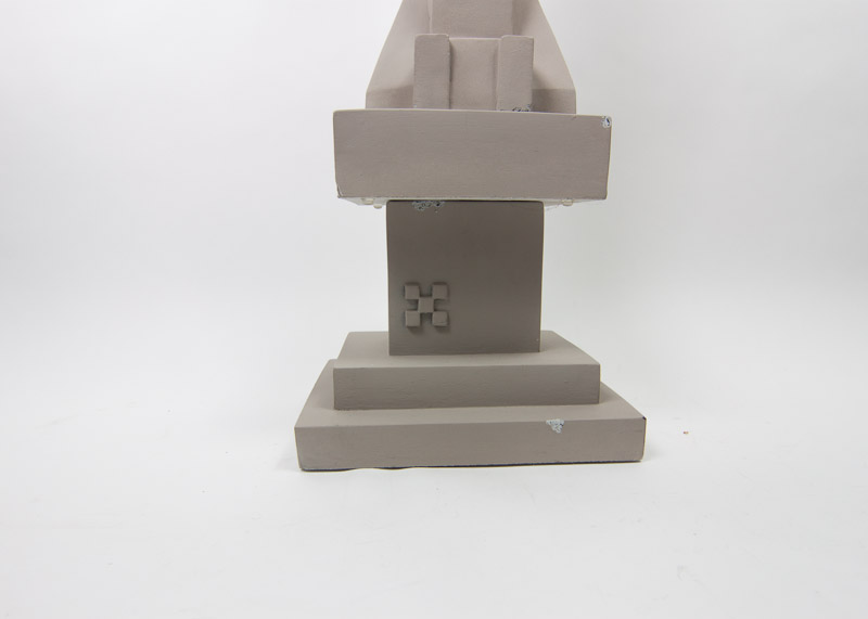 Two Frank Lloyd Wright "Sprite" Reproduction Sculptures