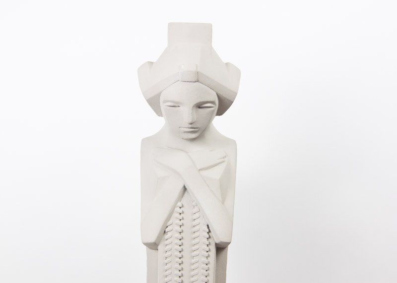 Two Frank Lloyd Wright "Sprite" Reproduction Sculptures