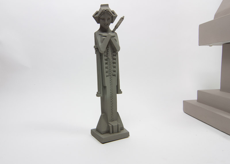 Two Frank Lloyd Wright "Sprite" Reproduction Sculptures