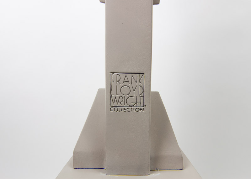 Two Frank Lloyd Wright "Sprite" Reproduction Sculptures