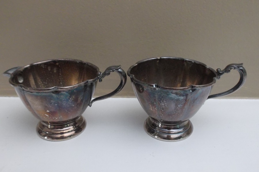 Assortment of Twelve Silver Plate Serving Pieces