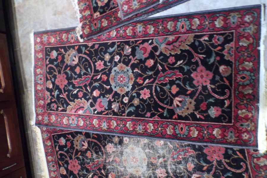 Four Machine Made Persian Style Area Rugs