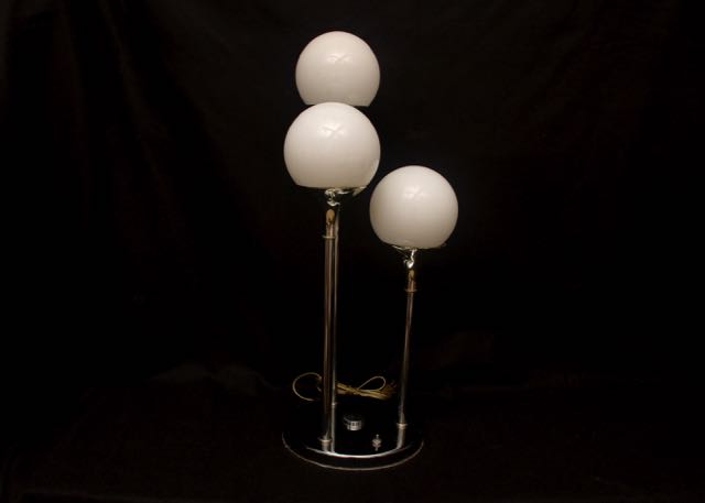 Modern Table or Floor Lamp With Three Lighted White Glass Globes