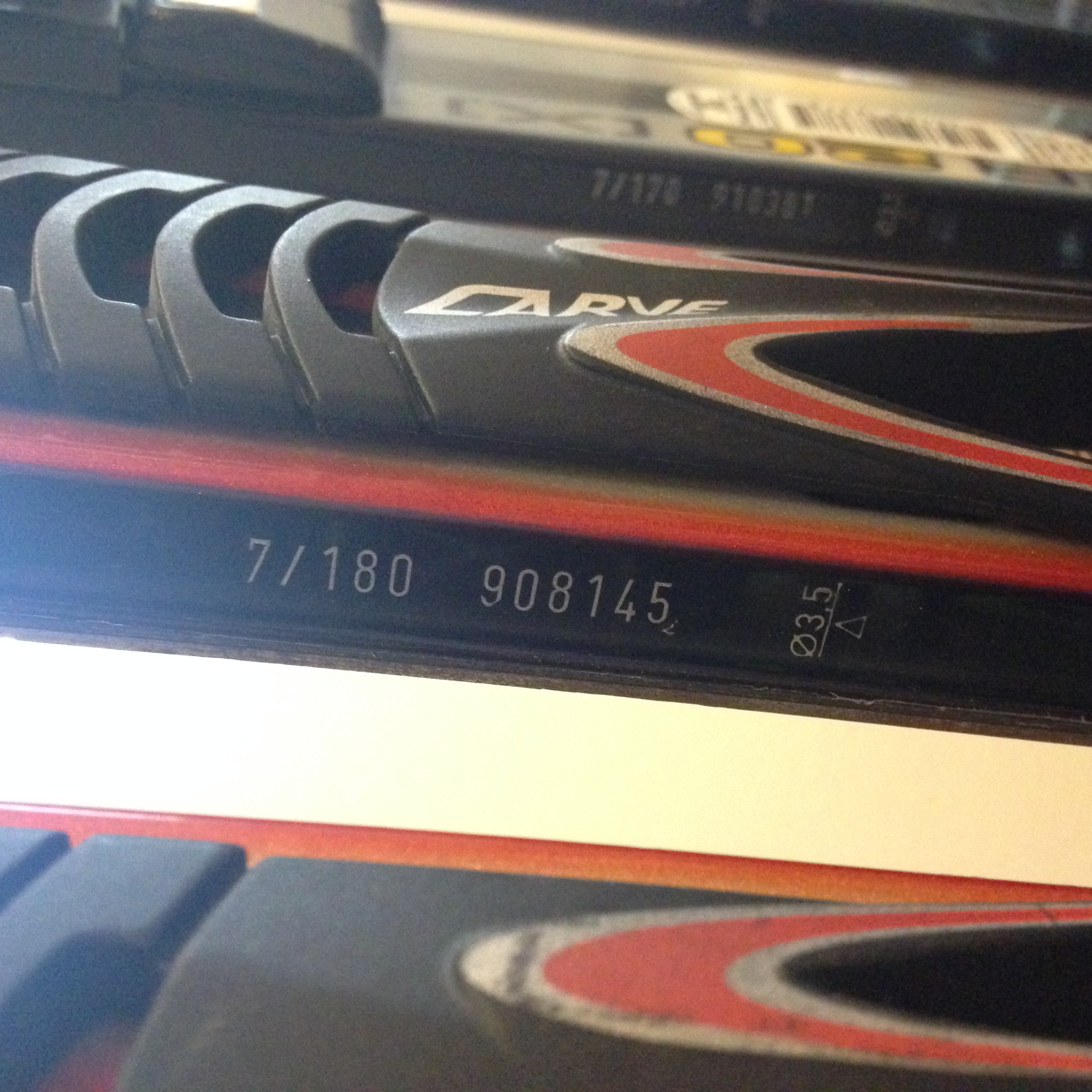 Two Pairs of Head Skis with Ski Holder